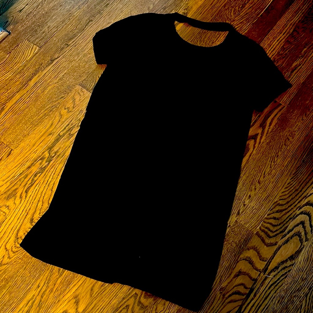 Size M t-shirt dress with cut out back.